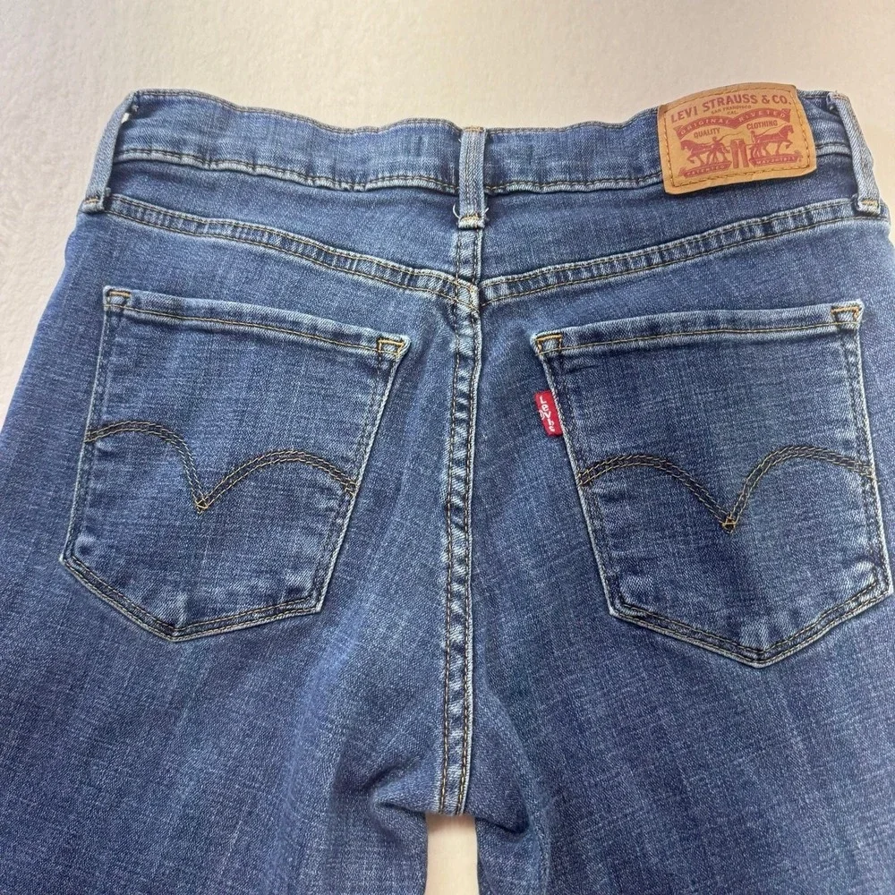 Levi's Women's 311 Shaping Skinny Medium Wash Blue Denim‎ Jeans Size 26x30 - Picture 6 of 8